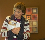 Lynn Holmes discussing some new postal programs in Oct.